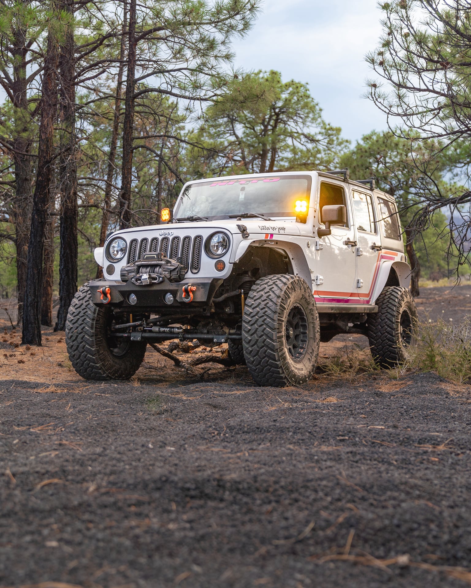 2015 Jeep Wrangler JKU on MetalCloak Outboard Shock Mount Spacer Relocation Kit Lower Front
