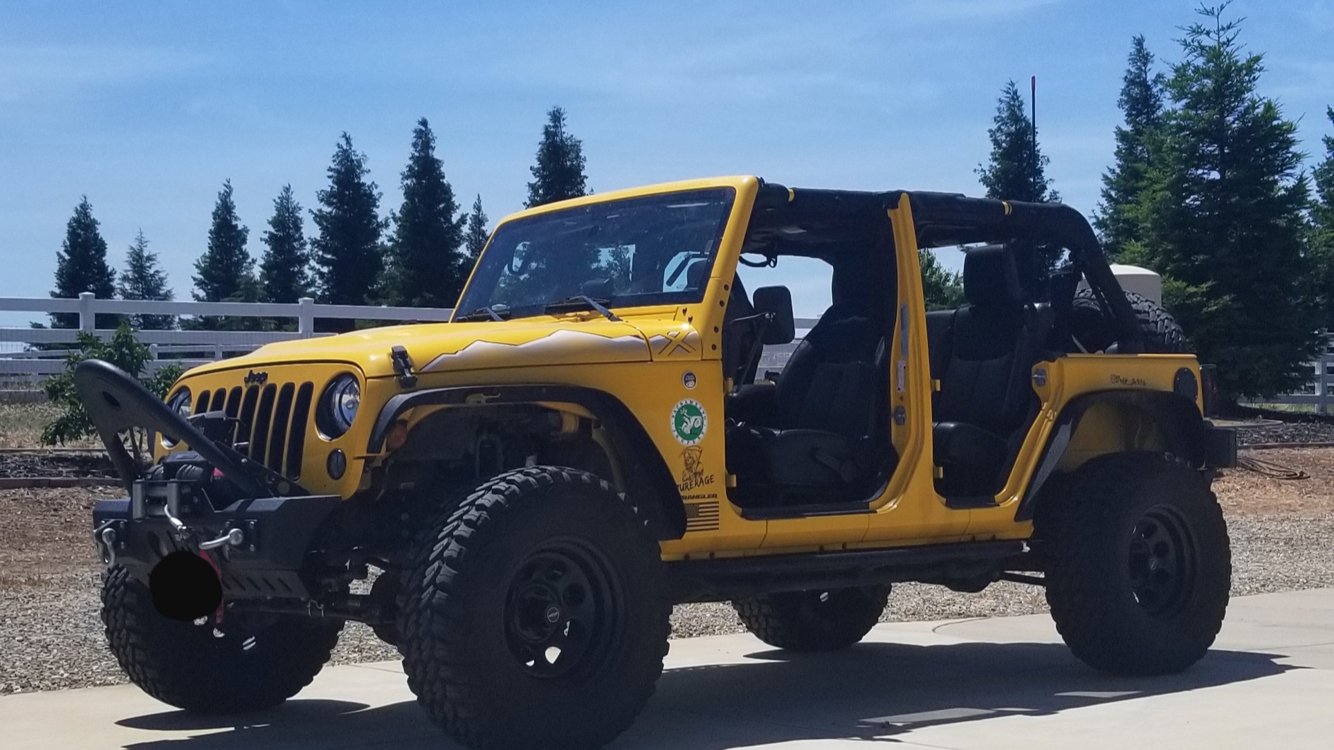 2015 Jeep Wrangler JKU on Pro Comp Xtreme MT2